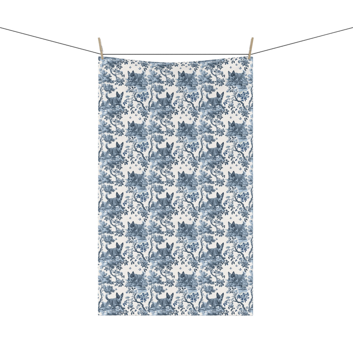 Australian Cattle Dog Blue Tea Towel with blue toile design, hanging from a clothesline, showing the full repeating design.