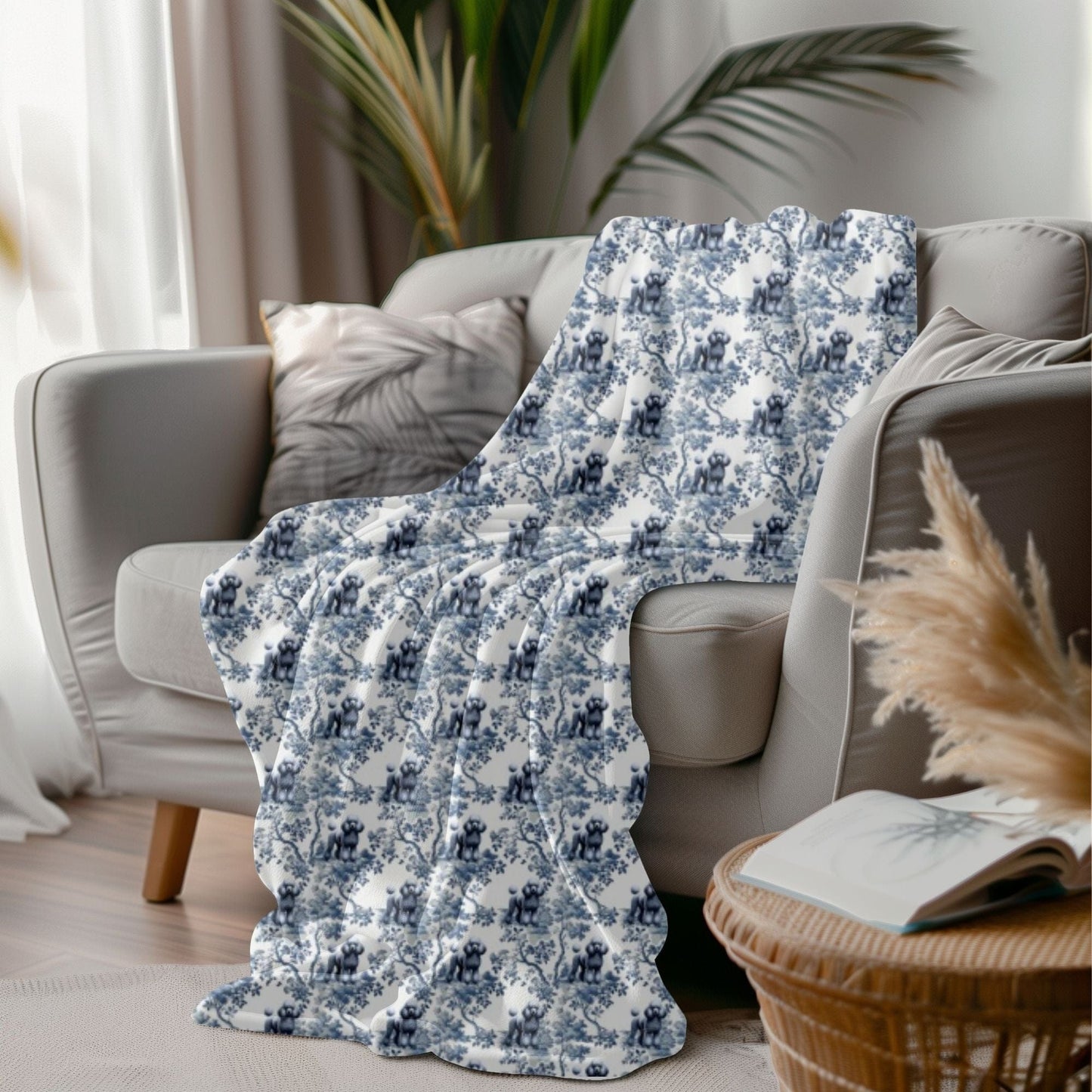 Toile Poodle throw blanket draped in a lifestyle setting