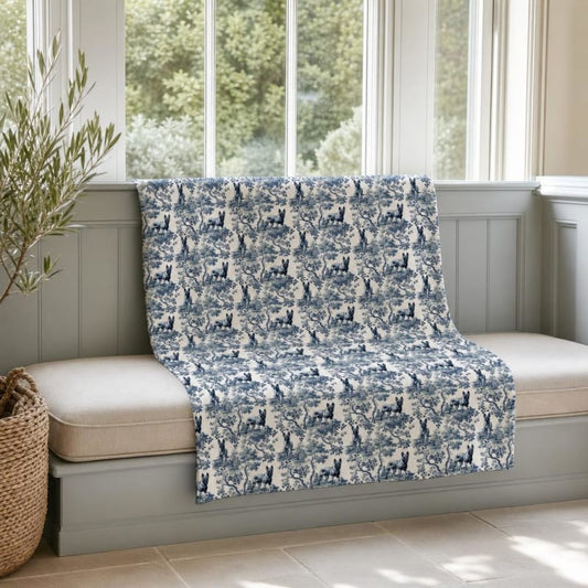 Belgian Malinois breed toile blanket on a window seat