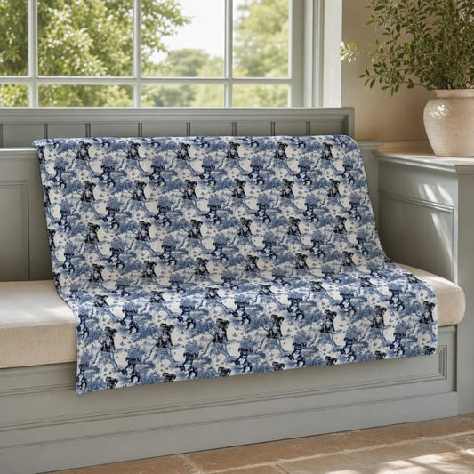 Boxer breed toile blanket on a window seat