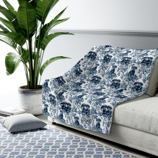 French toile dog blanket draped on a sofa, a gift for dog lovers