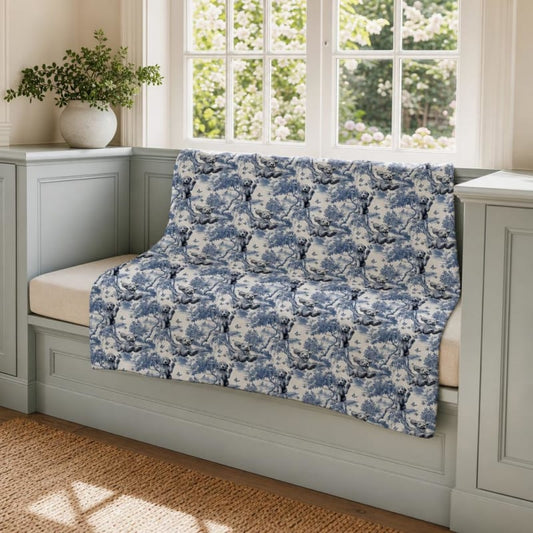 Goldendoodle breed toile blanket on a window seat