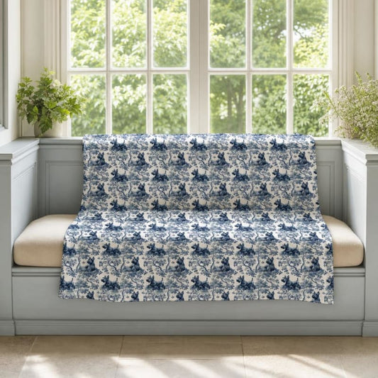 Scottish Terrier breed toile blanket on a window seat