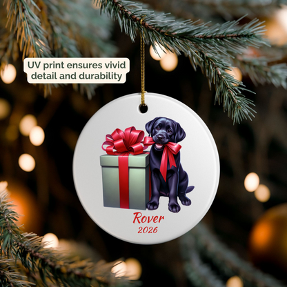 Personalized black Labrador Retriever ornament hanging on a lit Christmas tree