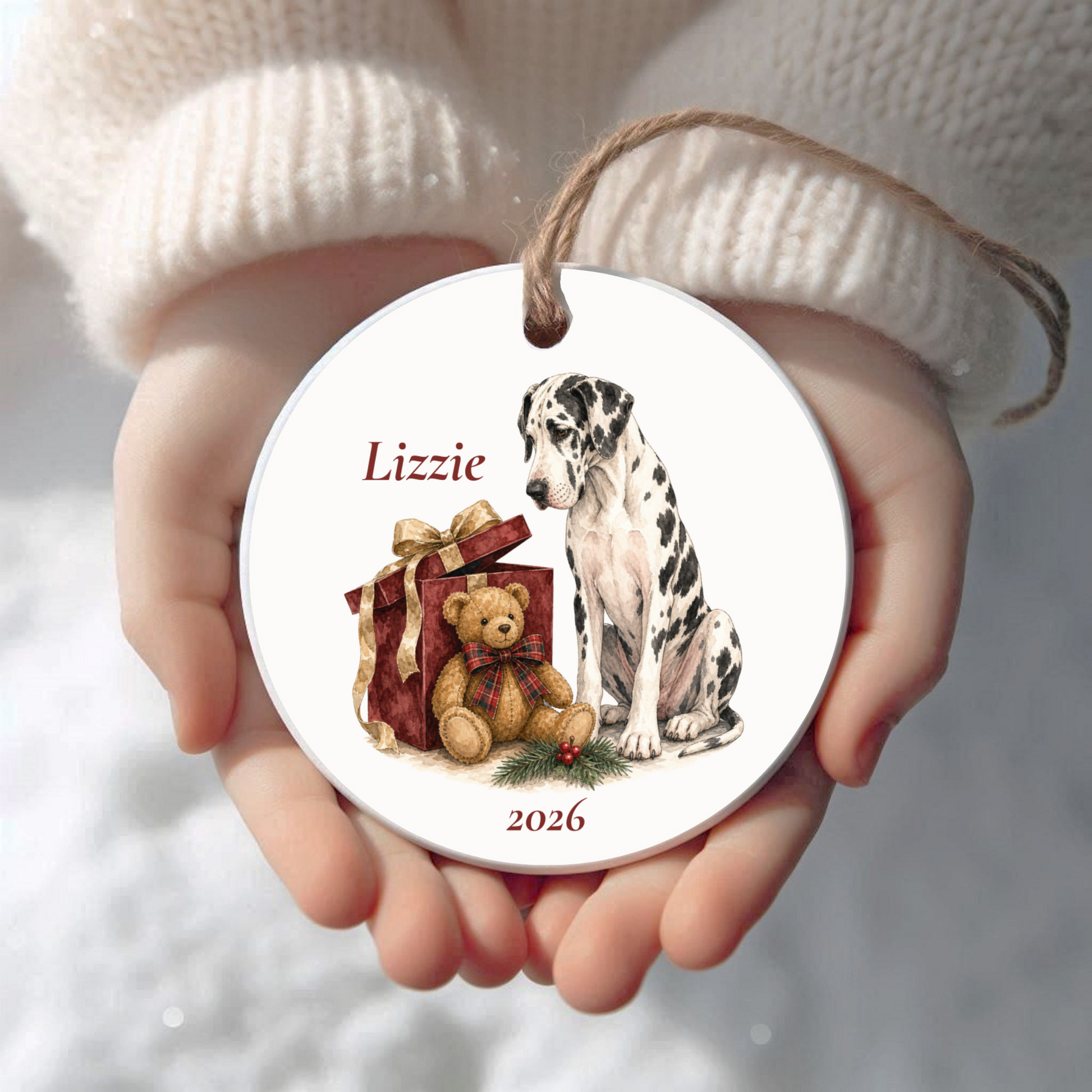 Personalized Great Dane (Harlequin) Christmas ornament held in cupped hands
