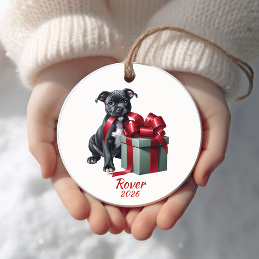 Personalized American Staffordshire Terrier Christmas ornament held in cupped hands