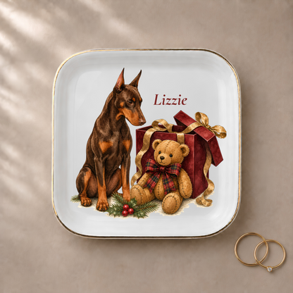 Doberman jewelry dish styled with gold rings and a personalized name