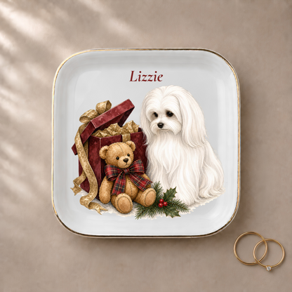 Maltese jewelry dish styled with gold rings and a personalized name
