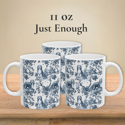 11 oz blue toile Bearded Collie coffee mug shown from three sides