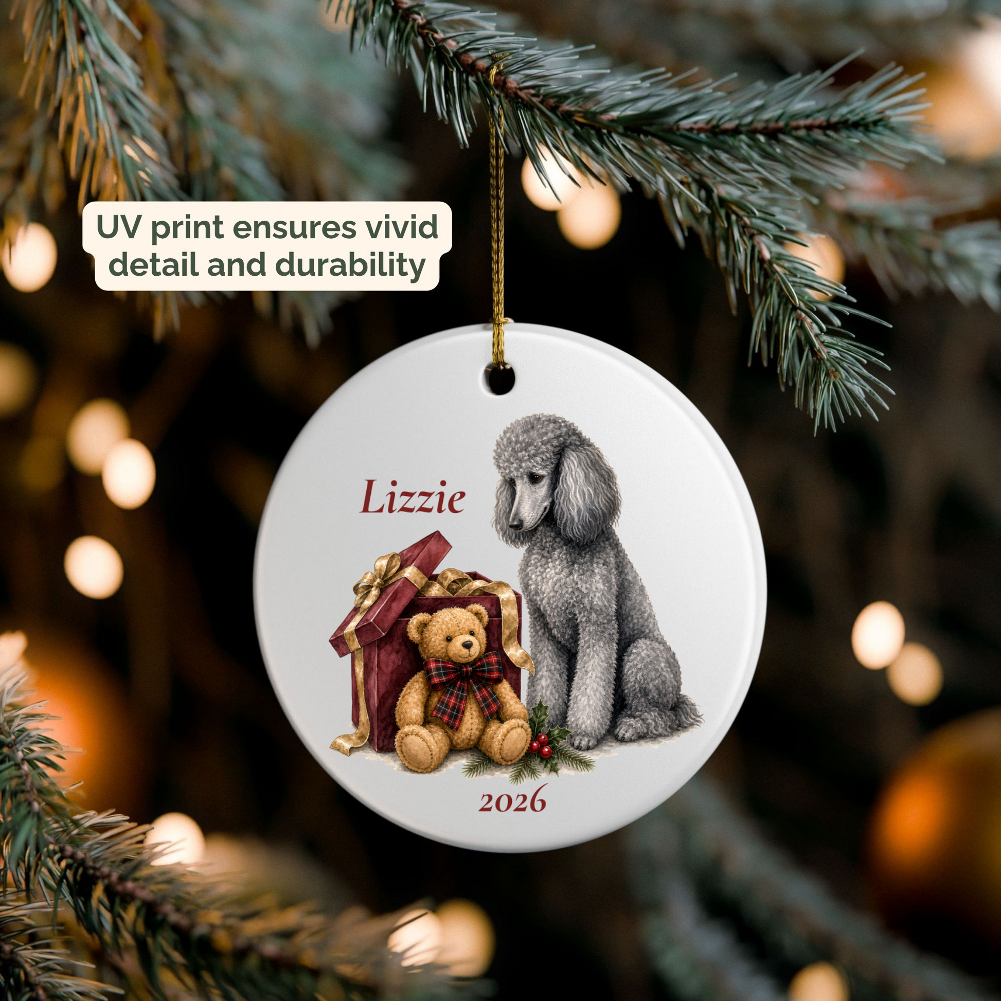 Personalized Silver Standard Poodle ornament hanging on a lit Christmas tree