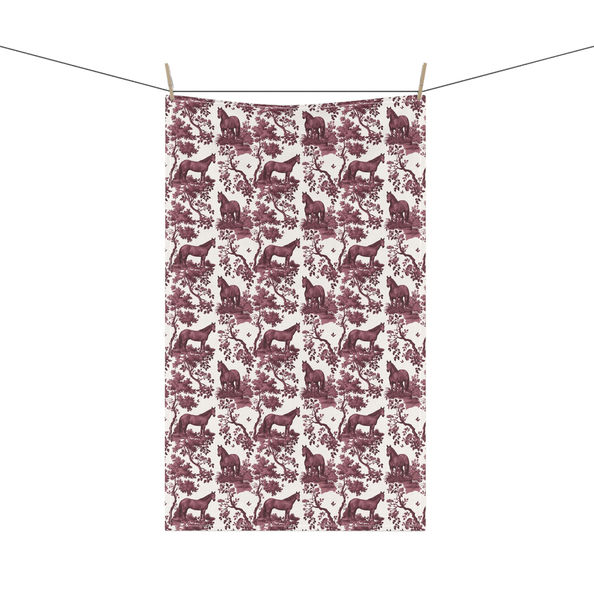 Quarter Horse Tea Towel with cranberry toile design, hanging from a clothesline, showing the full repeating design.