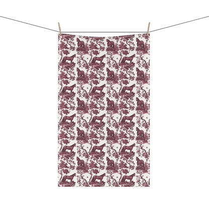 Quarter Horse Tea Towel with cranberry toile design, hanging from a clothesline, showing the full repeating design.