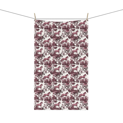 Horse Tea Towel with cranberry toile design, hanging from a clothesline, showing the full repeating design.
