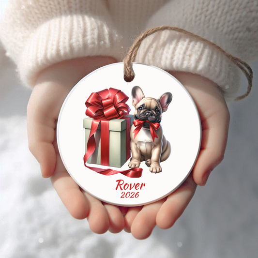 Personalized fawn French Bulldog Christmas ornament held in cupped hands