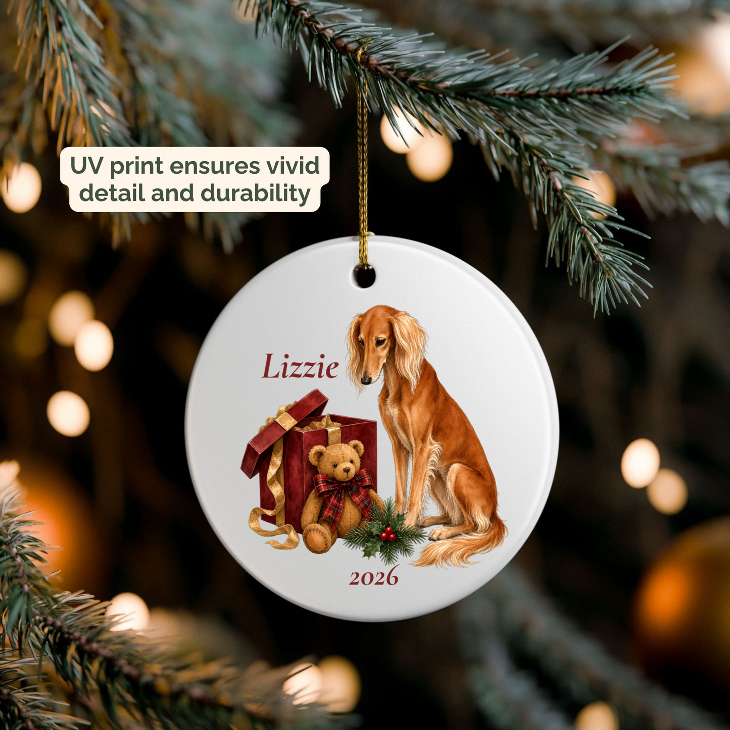 Personalized Saluki (Red) ornament hanging on a lit Christmas tree