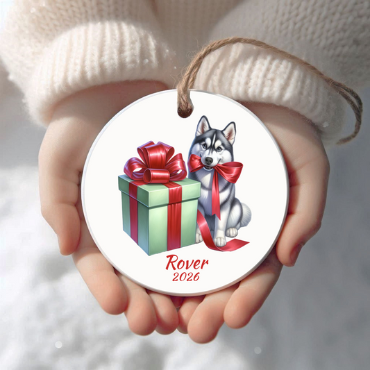 Personalized Siberian Husky Christmas ornament held in cupped hands