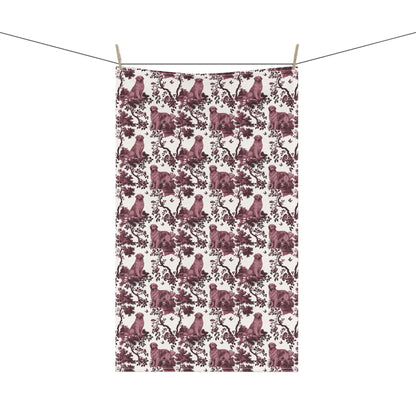 Golden Retriever Tea Towel with cranberry toile design, hanging from a clothesline, showing the full repeating design.