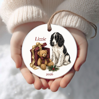 Personalized English Springer Spaniel (Black) Christmas ornament held in cupped hands