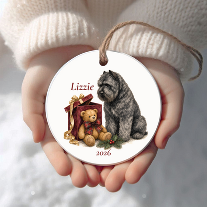 Personalized Bouvier des Flandres Christmas ornament held in cupped hands