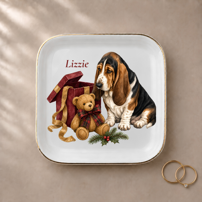 Basset Hound jewelry dish styled with gold rings and a personalized name