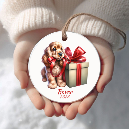 Personalized Cocker Spaniel Christmas ornament held in cupped hands