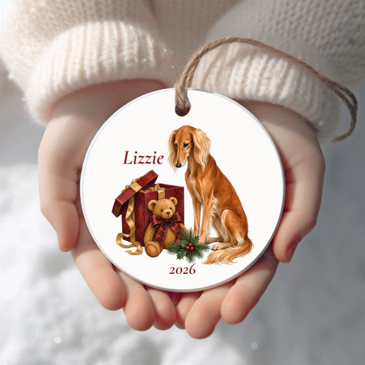 Personalized Saluki (Red) Christmas ornament held in cupped hands