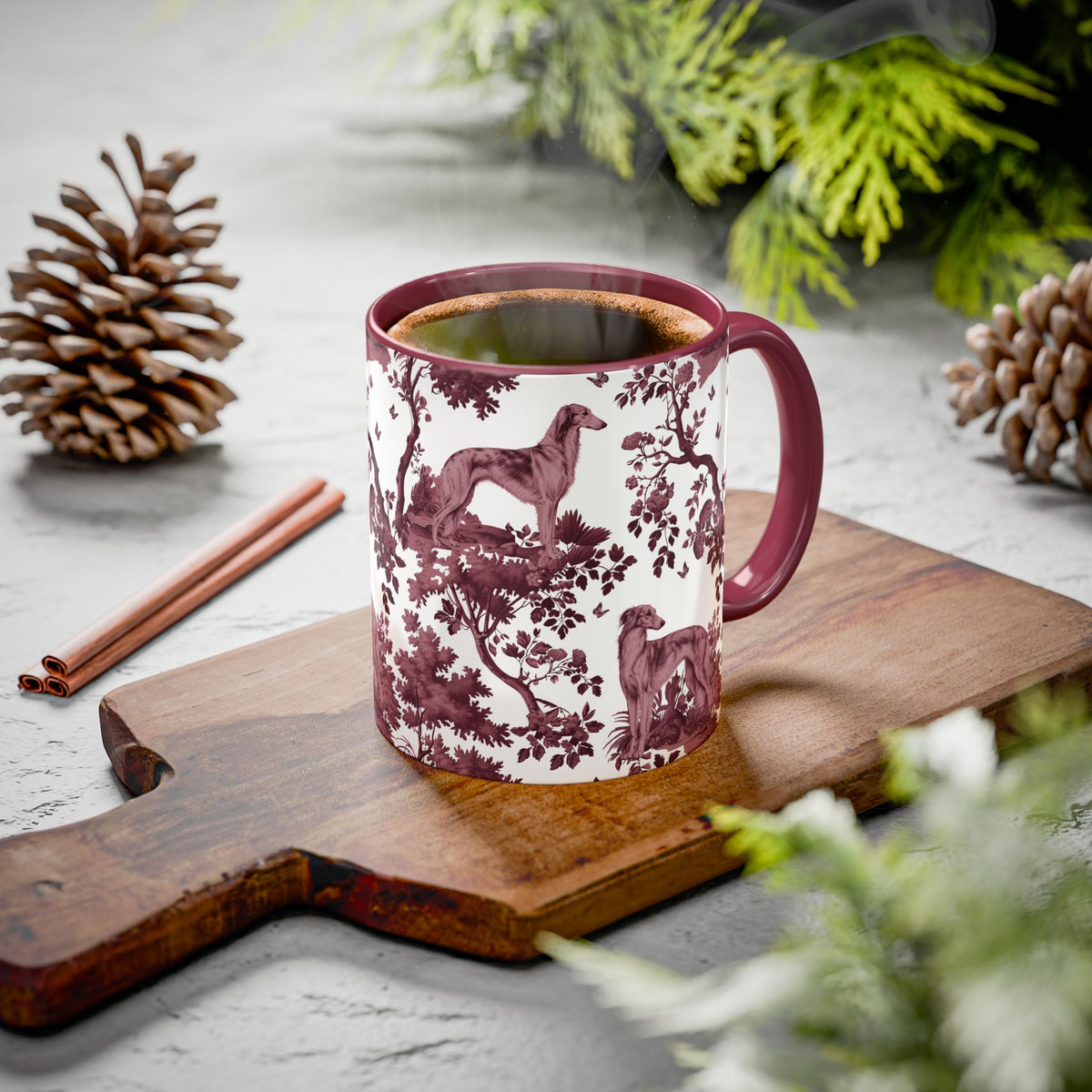Silken Windhound cranberry toile ceramic mug styled on a table, lifestyle photo