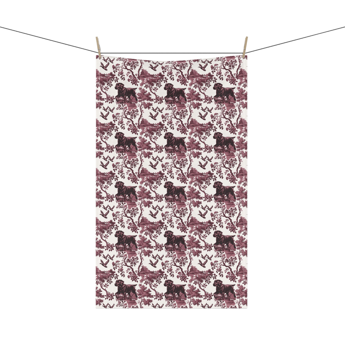 Black Labrador Duck Tea Towel with cranberry toile design, hanging from a clothesline, showing the full repeating design.