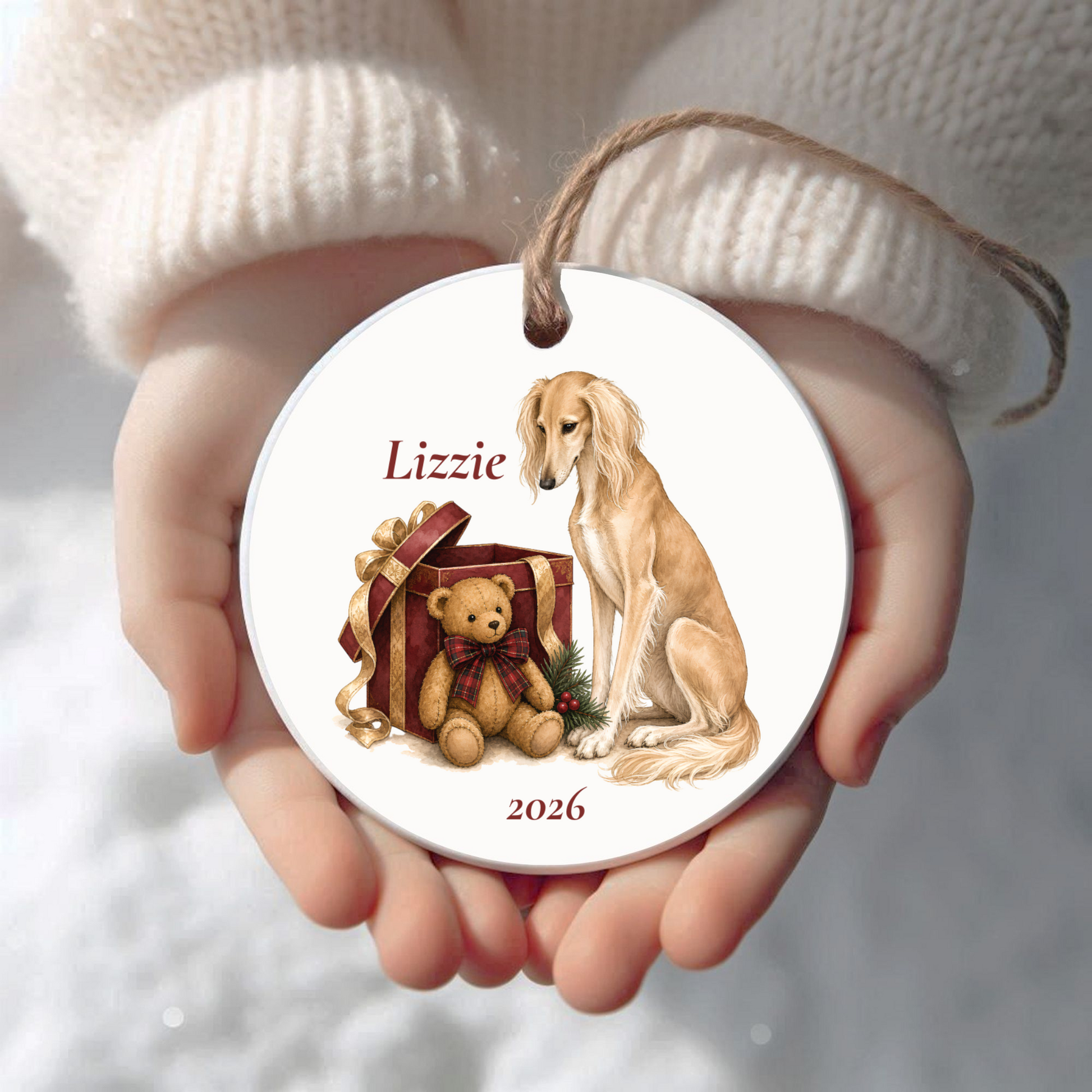 Personalized Saluki (Fawn) Christmas ornament held in cupped hands
