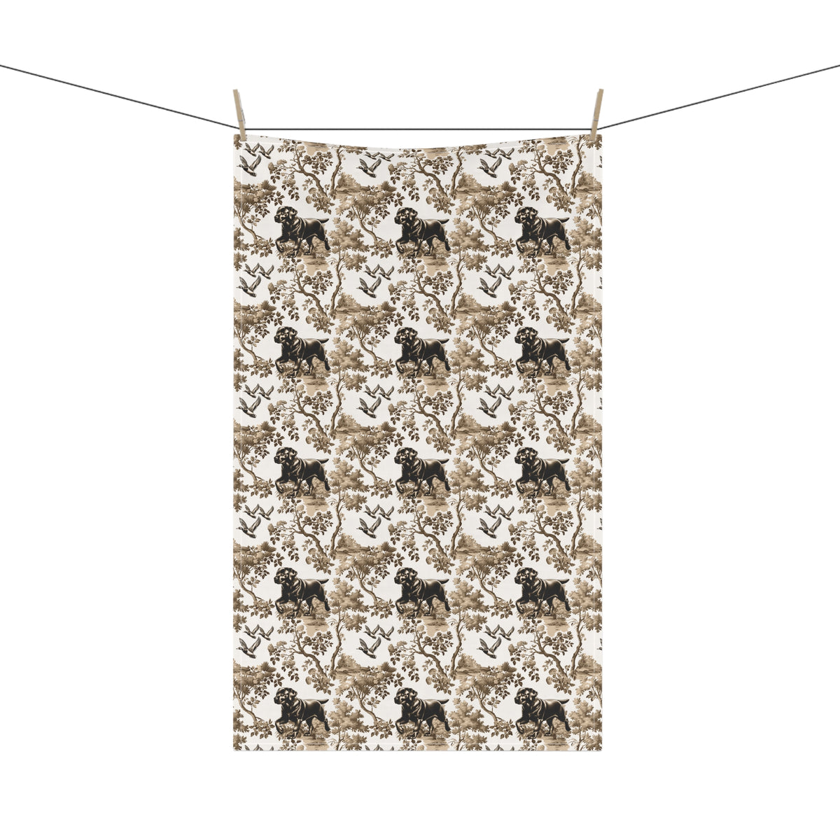 Black Labrador Tea Towel with brown and tan toile design, hanging from a clothesline, showing the full repeating design.