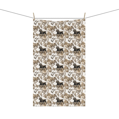 Black Labrador Tea Towel with brown and tan toile design, hanging from a clothesline, showing the full repeating design.