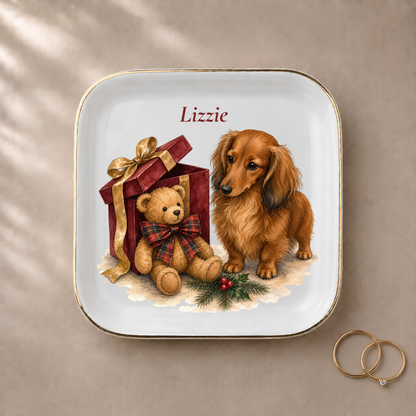 Longhaired Dachshund jewelry dish styled with gold rings and a personalized name