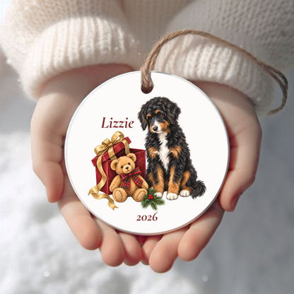 Personalized Aussiedoodle (Black Tricolor) Bear Necessities Christmas ornament held in cupped hands