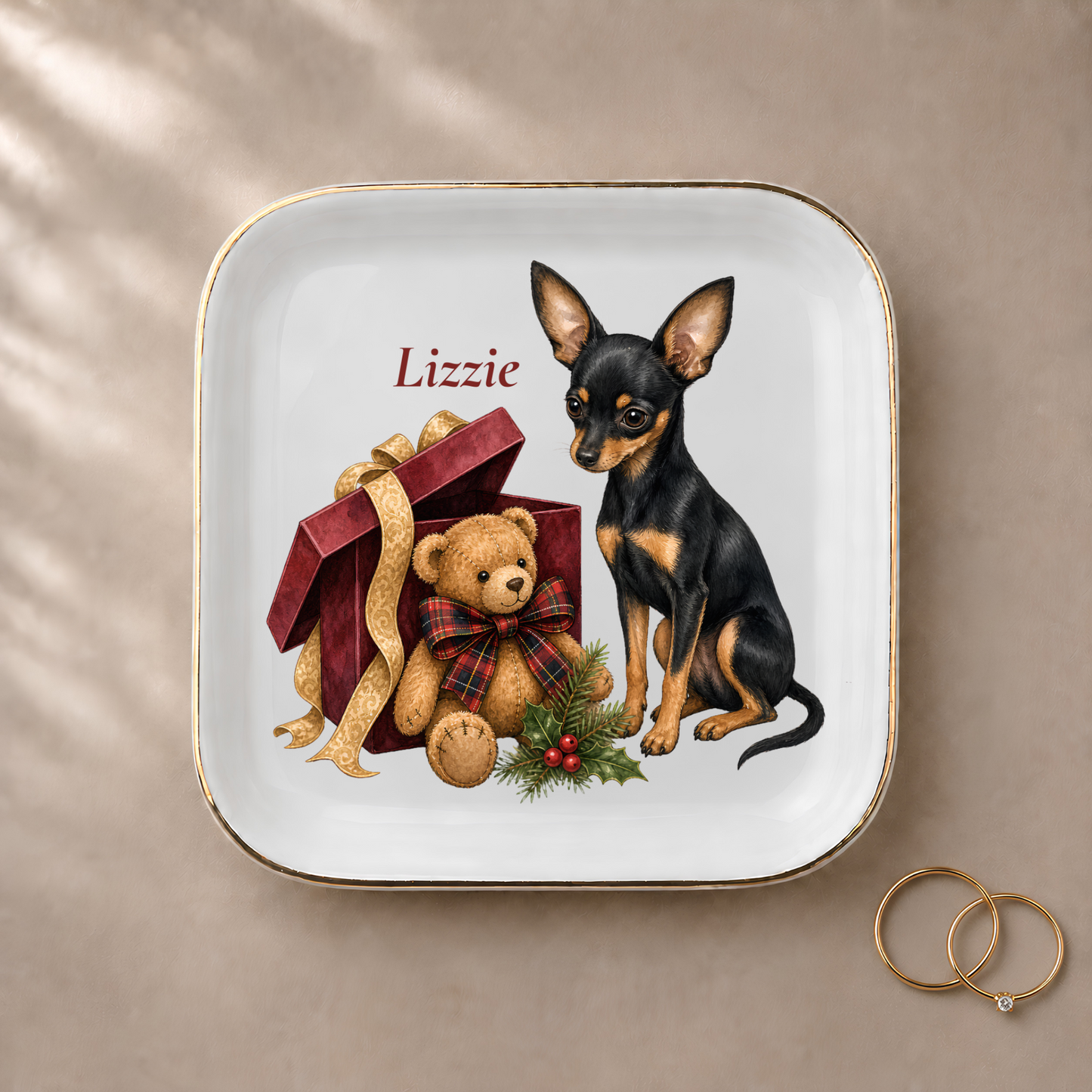 Russian Toy jewelry dish styled with gold rings and a personalized name