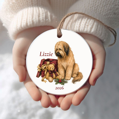 Personalized Briard Christmas ornament held in cupped hands