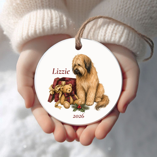 Personalized Briard Christmas ornament held in cupped hands
