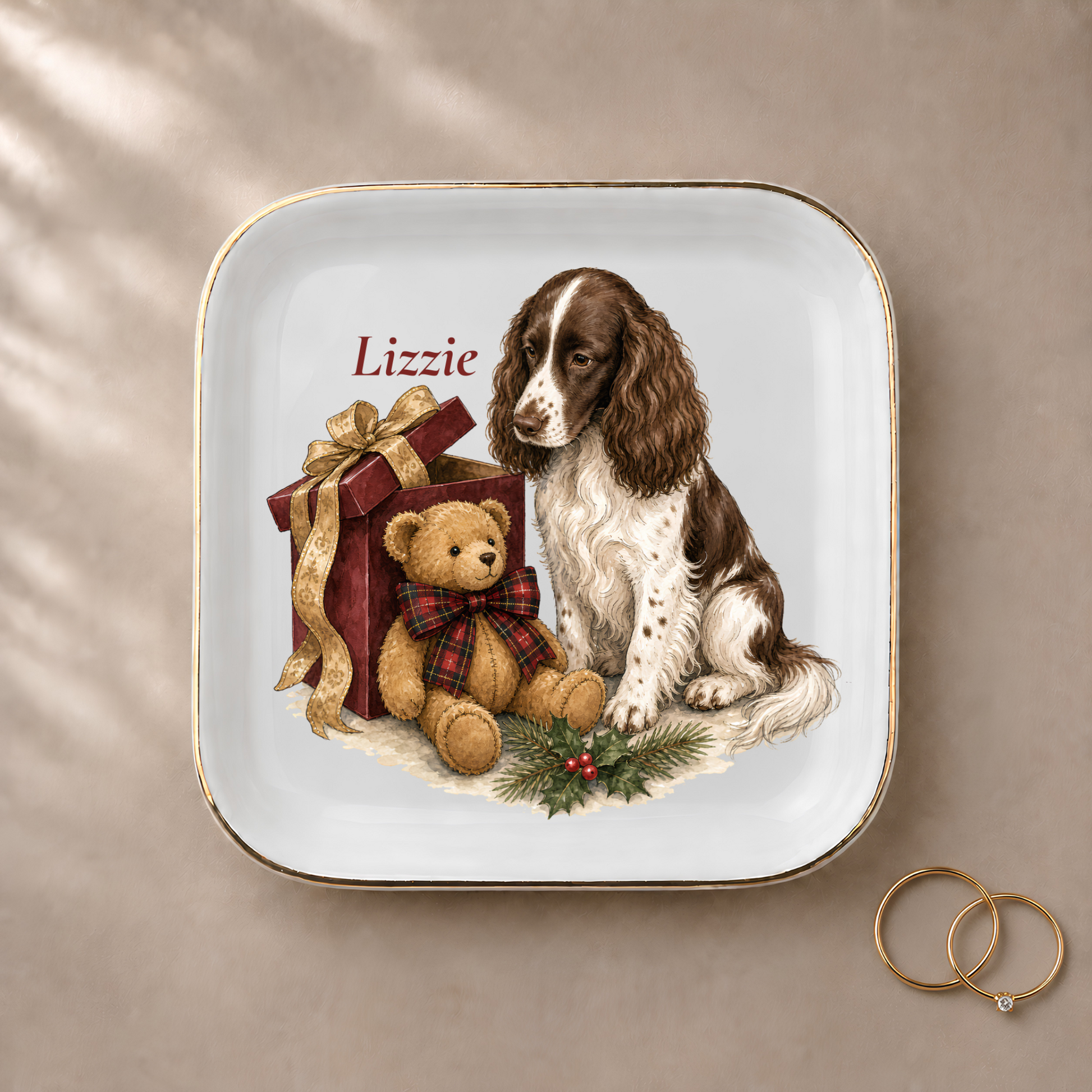 English Springer Spaniel jewelry dish styled with gold rings and a personalized name