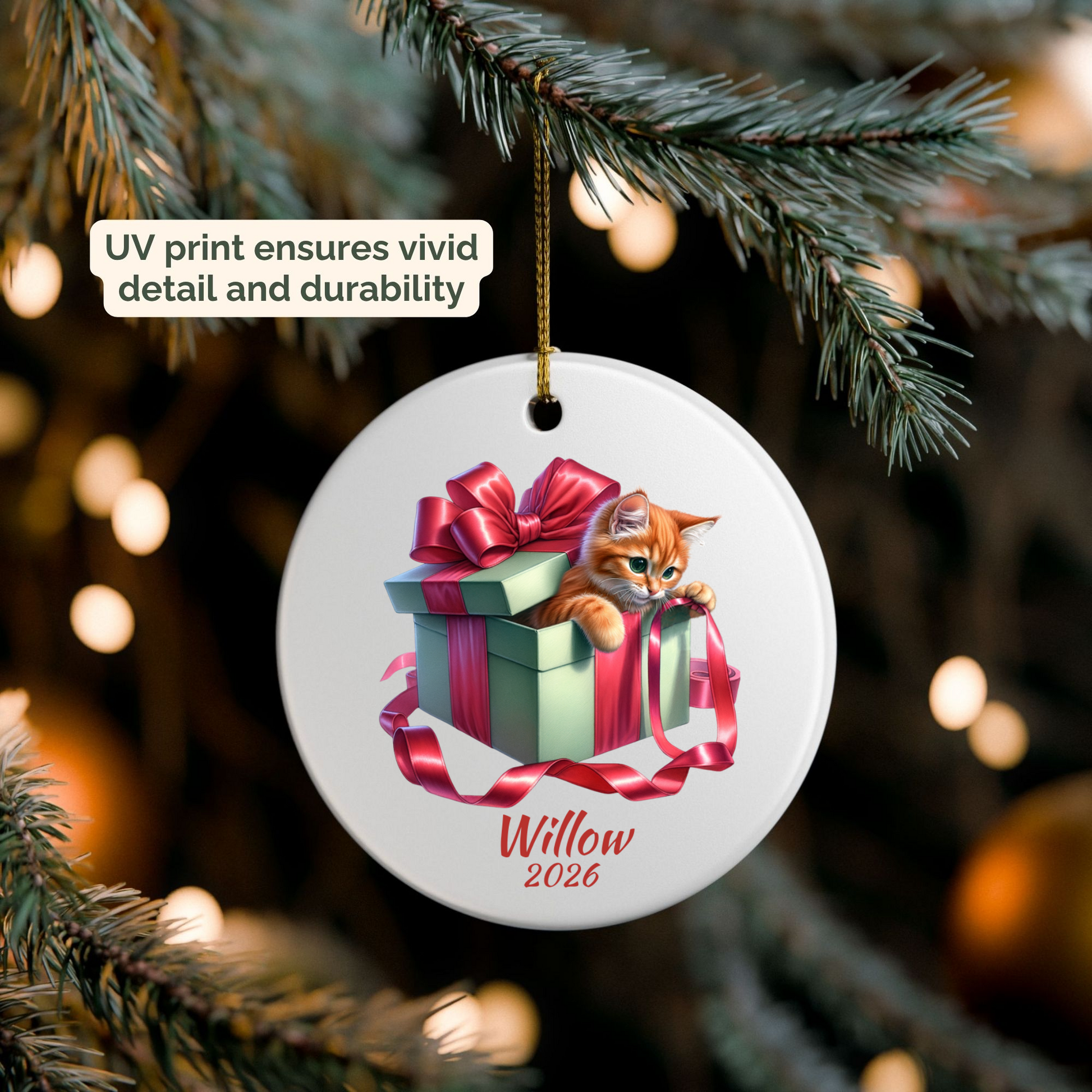 Personalized Orange Cat ornament hanging on a lit Christmas tree