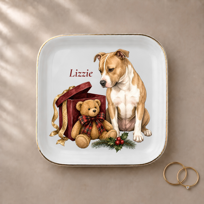 Pitbull jewelry dish styled with gold rings and a personalized name