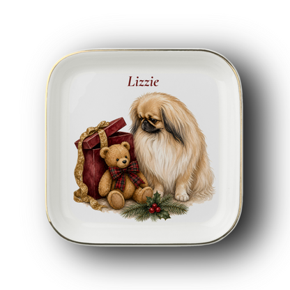 Pekingese jewelry dish on a white background