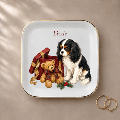 Cavalier King Charles Spaniel jewelry dish styled with gold rings and a personalized name