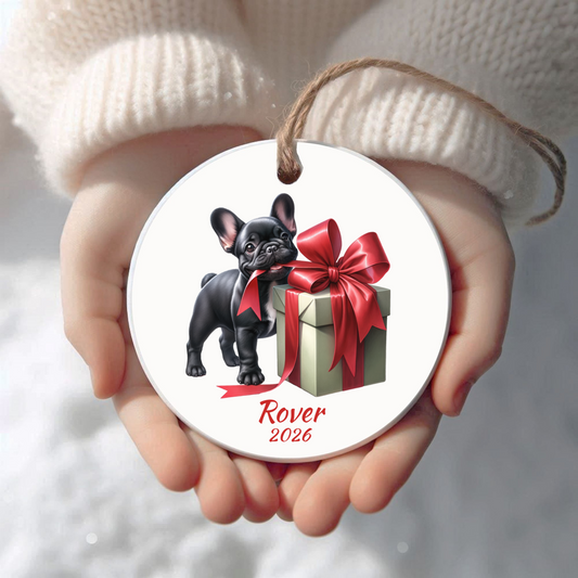 Personalized black French Bulldog Christmas ornament held in cupped hands