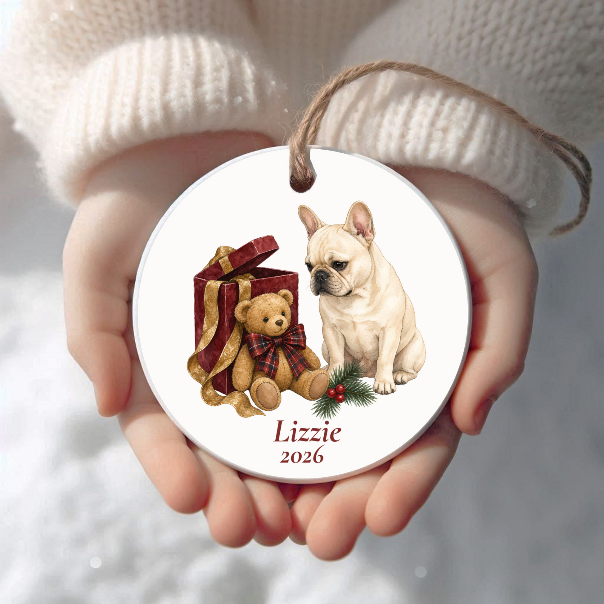 Personalized French Bulldog (Cream) Christmas ornament held in cupped hands