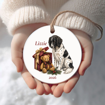 Personalized Large Munsterlander Christmas ornament held in cupped hands