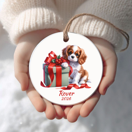 Personalized Blenheim Cavalier King Charles Spaniel Christmas ornament held in cupped hands