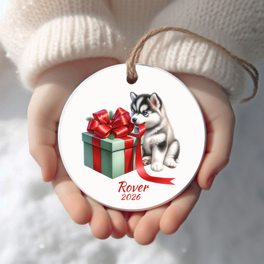 Personalized Siberian Husky Christmas ornament held in cupped hands