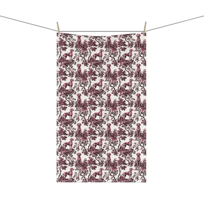 Weimaraner Tea Towel with cranberry toile design, hanging from a clothesline, showing the full repeating design.