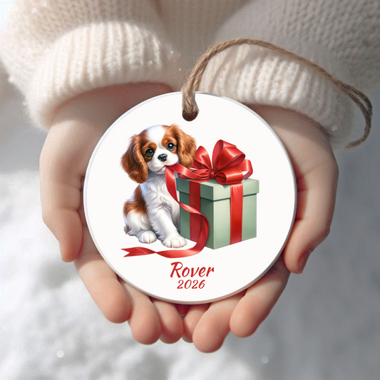 Personalized Blenheim Cavalier King Charles Spaniel Christmas ornament held in cupped hands
