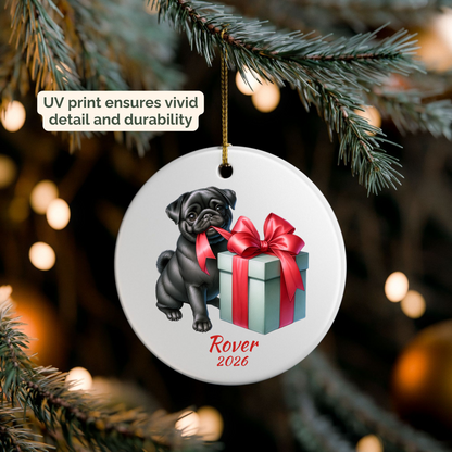 Personalized black Pug ornament hanging on a lit Christmas tree