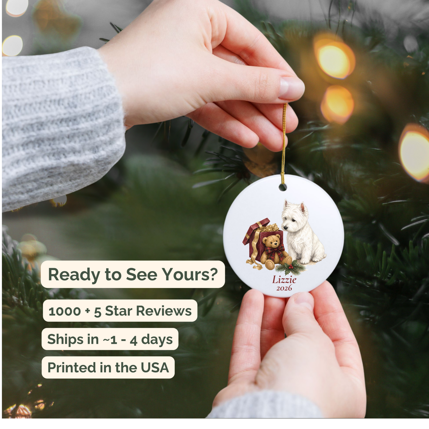 Hand holding a personalized West Highland Terrier ceramic ornament beside a Christmas tree